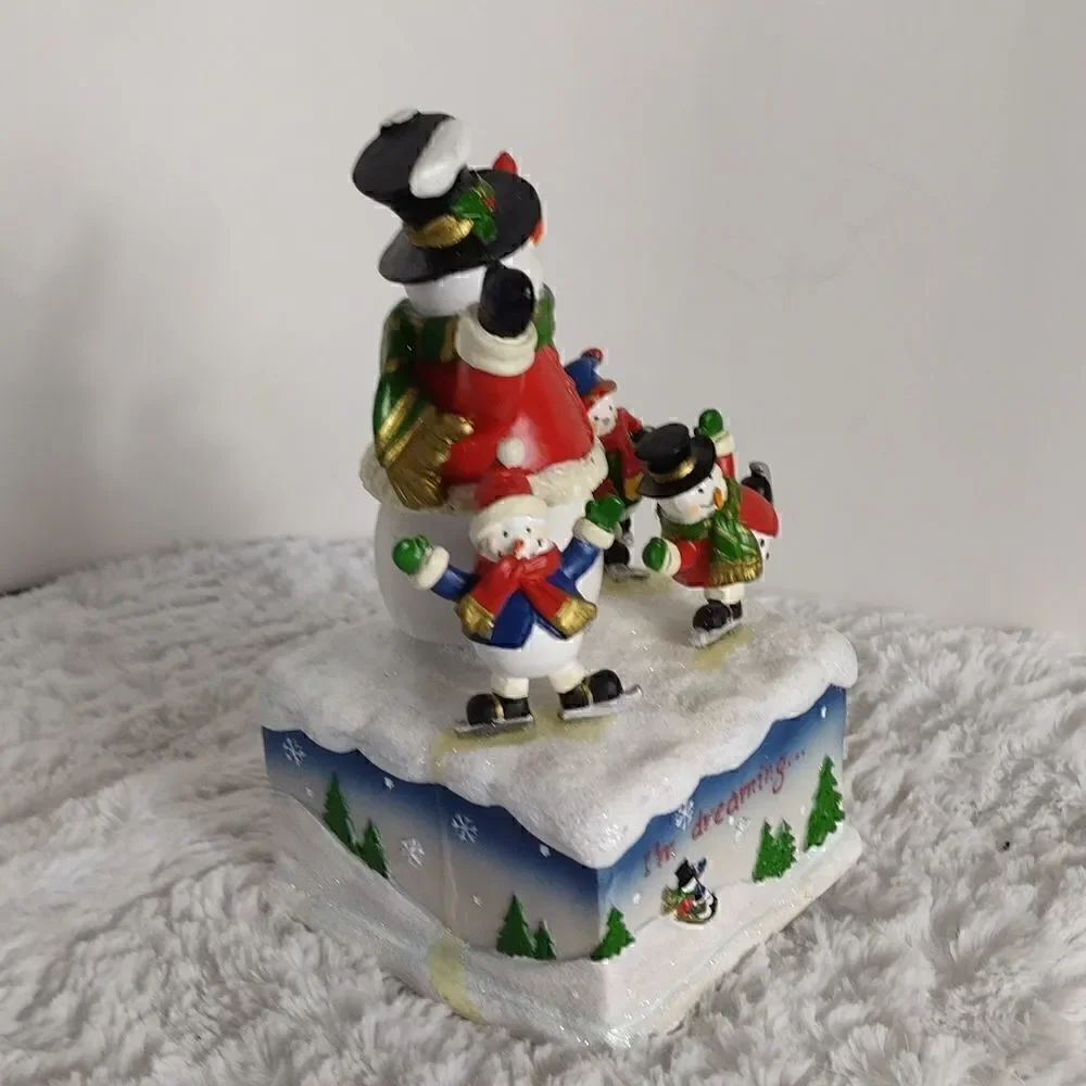 Musical Snowman Family Spinning Figurine